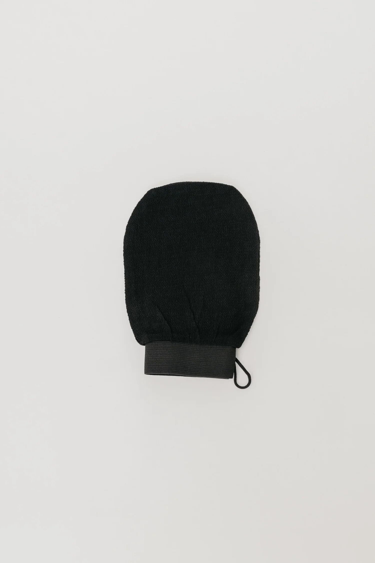 Double-sided exfoliating mitt for pre-tan skin prep by The Sunless Bar
